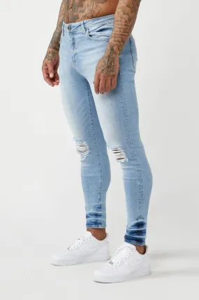 PREMIUM SKINNY FIT JEANS - LIGHT BLUE RIPPED KNEE