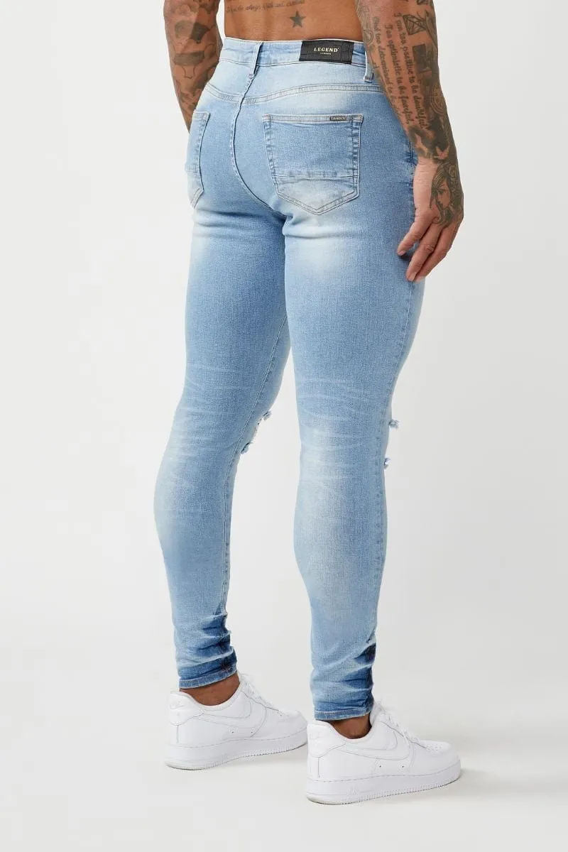 PREMIUM SKINNY FIT JEANS - LIGHT BLUE RIPPED KNEE