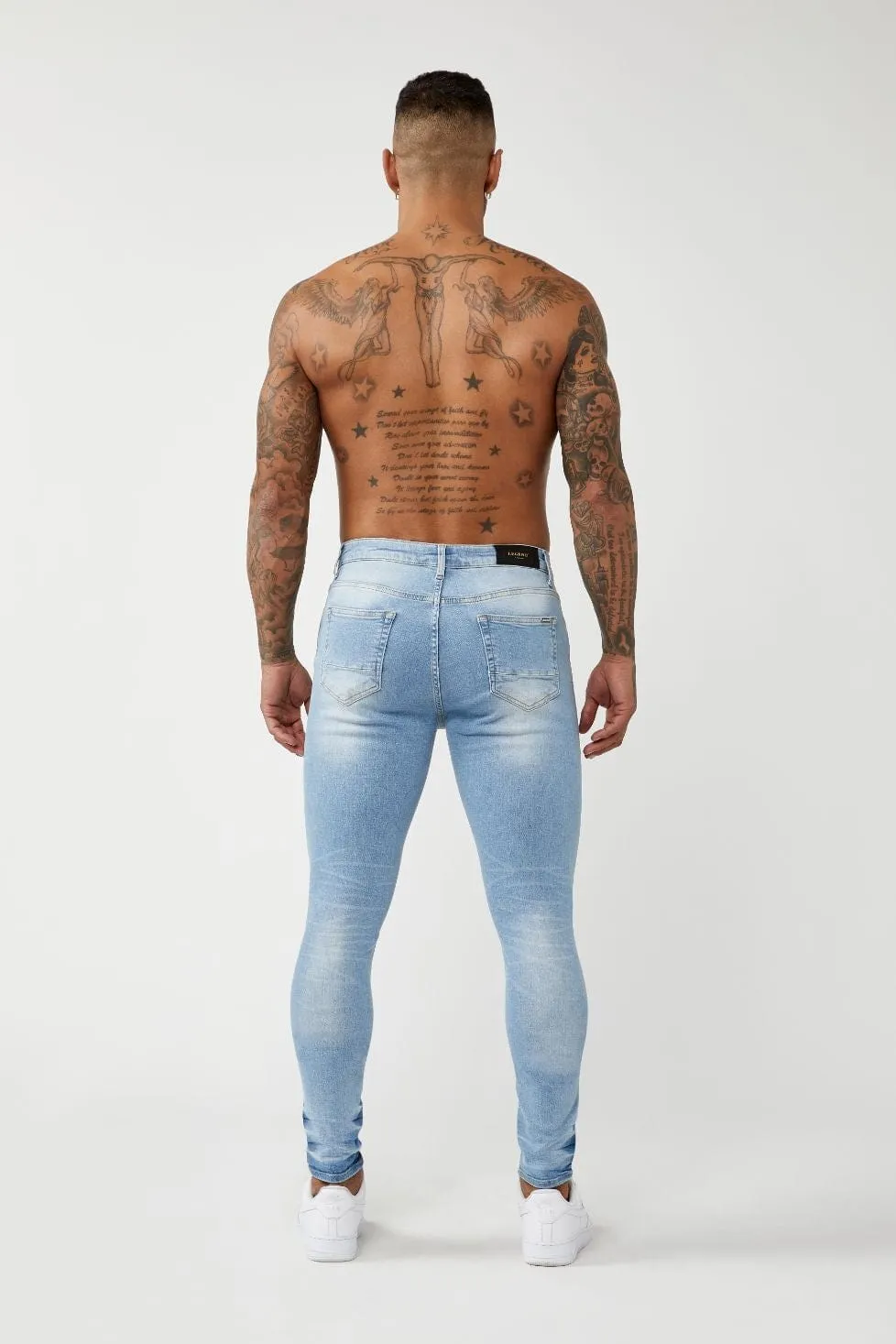 PREMIUM SKINNY FIT JEANS - LIGHT BLUE RIPPED KNEE